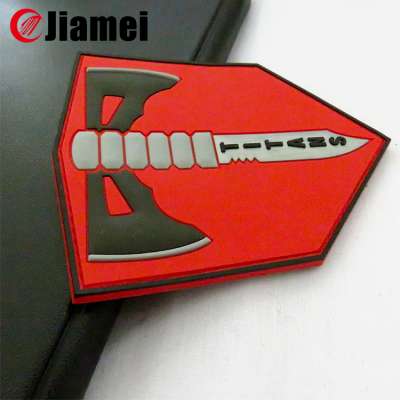 Cheap soft pvc injection mould clothing rubber label for garment